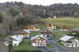 Discover the charm of these stunning chalets nestled in a picturesque mountain setting.