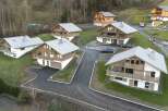Discover the charm of these stunning chalets nestled in a picturesque mountain setting.