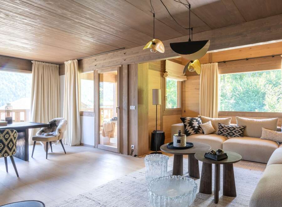 Experience luxury living in this stunning property featuring a cozy living room with a modern design.