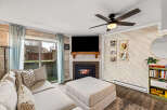 This cozy living room features a fireplace, perfect for those chilly evenings.