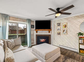 This cozy living room features a fireplace, perfect for those chilly evenings.