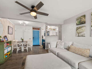 Step into this inviting living space, perfect for both relaxation and entertaining.