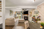 This cozy living space features a modern fireplace, perfect for those chilly evenings.