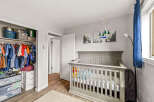 This charming nursery offers a serene and inviting space for your little one.