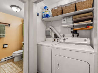 Discover the convenience of in-unit laundry in this charming property! This home features a dedicated laundry area with a washer and dryer, making chores a breeze.