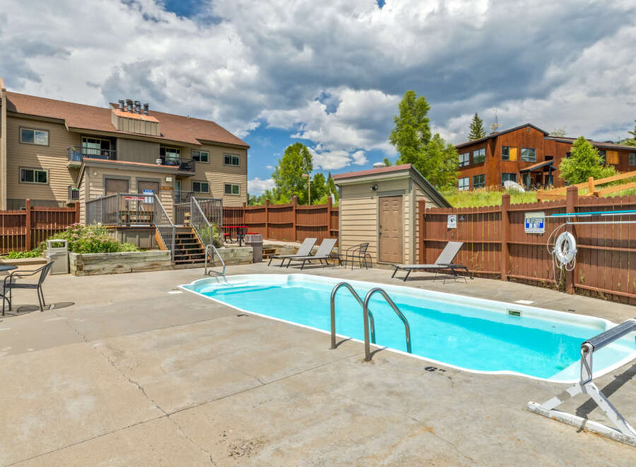 Enjoy a refreshing dip in the inviting outdoor pool, perfect for relaxation and recreation.