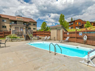 Enjoy a refreshing dip in the inviting outdoor pool, perfect for relaxation and recreation.