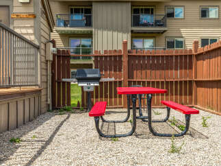 Enjoy outdoor living at its finest with this charming property! This space features a private grilling area, perfect for hosting summer barbecues.