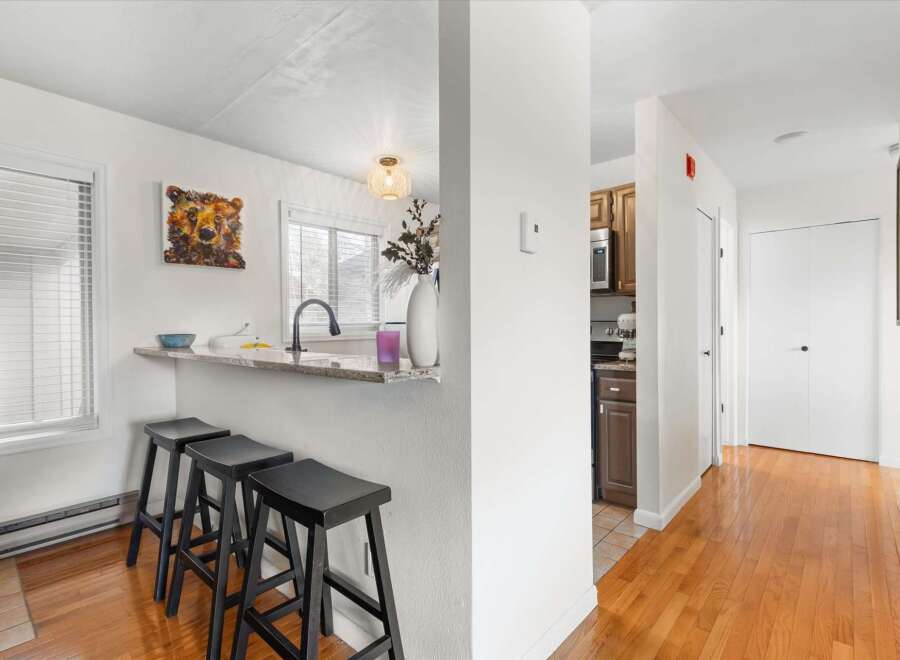 Discover this charming property featuring a stylish kitchen with a breakfast bar, perfect for casual dining and entertaining.