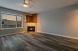 This stunning property boasts a cozy living room with a fireplace, perfect for those chilly evenings.