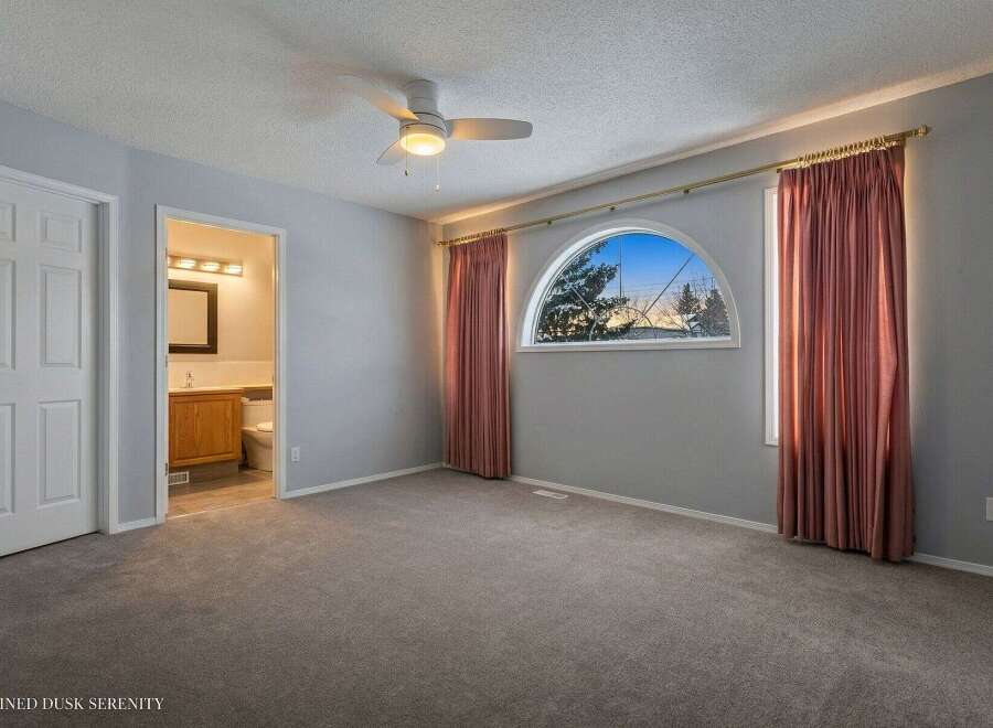 Step into a serene bedroom retreat.
