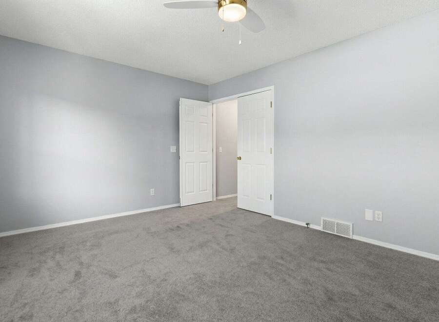 Step into this inviting bedroom, featuring a neutral color palette that offers a serene atmosphere.