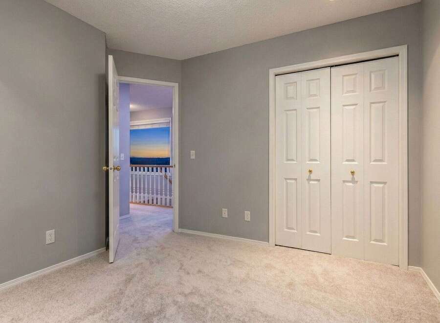 Step into this inviting bedroom, featuring a spacious layout and neutral color palette.