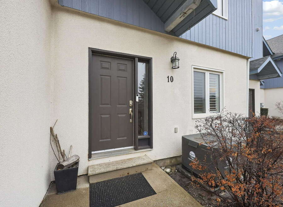 Welcome to this charming property! This home features a stylish front door and a welcoming entrance.