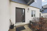 Welcome to this charming property! This home features a stylish front door and a welcoming entrance.