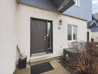 Welcome to this charming property! This home features a stylish front door and a welcoming entrance.