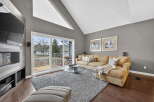 Step into luxury with this stunning living room, featuring a cozy sectional sofa and a plush area rug.