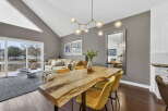 Step into luxury with this stunning property, featuring a spacious living area and a modern dining space.