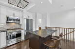 This stunning kitchen boasts modern appliances and elegant design.