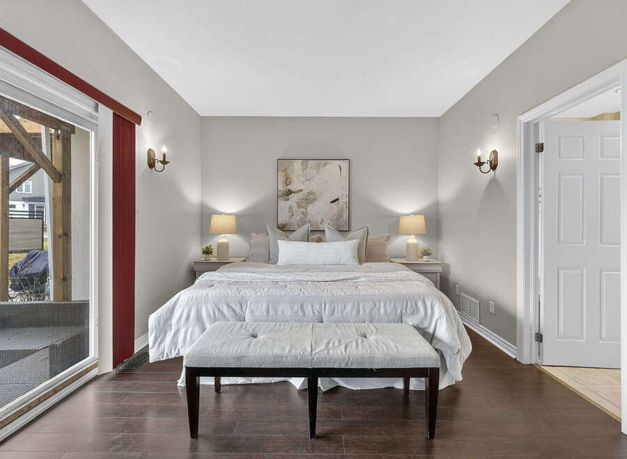 This stunning bedroom boasts a serene and inviting atmosphere, perfect for relaxation.