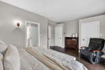 Step into this inviting bedroom, featuring a comfortable bed and ample space.