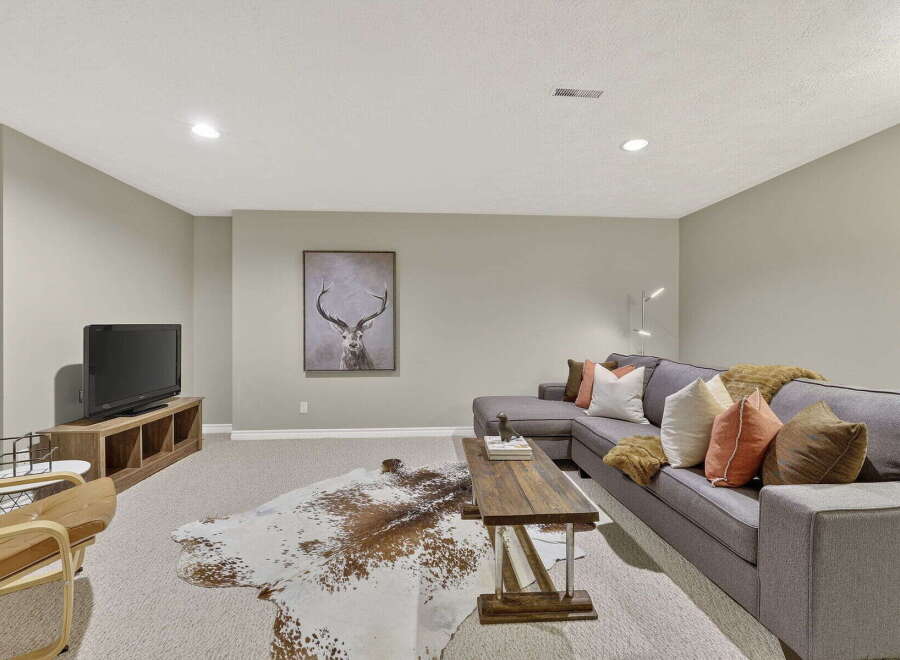 This stunning living room features a modern design with a cozy atmosphere.