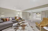 This inviting living space features a stylish sectional sofa, perfect for relaxing and entertaining.