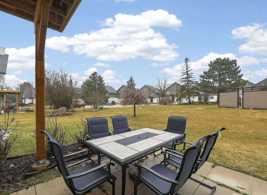 Enjoy outdoor living at its finest with this inviting patio space.