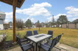 Enjoy outdoor living at its finest with this inviting patio space.