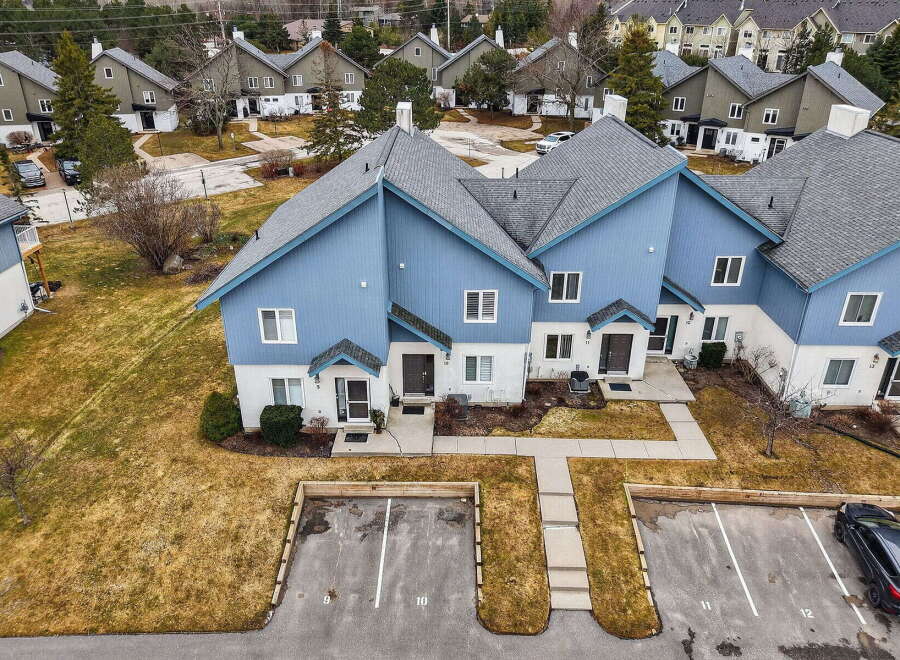 Discover a charming townhouse nestled in a serene community, perfect for comfortable living.