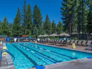 Enjoy the ultimate in luxury and relaxation at this stunning property, featuring a beautiful outdoor swimming pool.