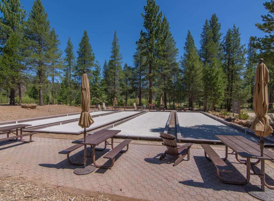 Enjoy outdoor recreation at this property featuring bocce ball courts, perfect for friendly competition.