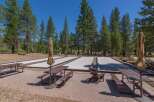 Enjoy outdoor recreation at this property featuring bocce ball courts, perfect for friendly competition.