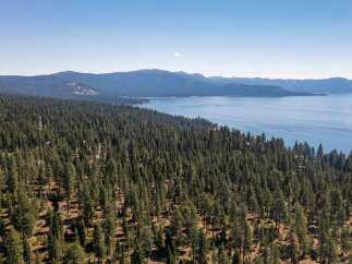 Discover the tranquility of this stunning property, nestled amidst a lush forest with breathtaking views.