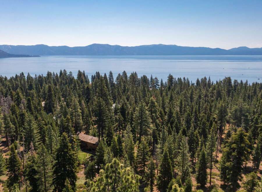 Nestled amidst a lush forest, this stunning property offers unparalleled privacy and tranquility.