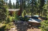 Nestled in a serene forest setting, this property offers a unique blend of rustic charm and natural beauty.