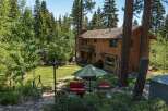 Nestled in a serene, wooded setting, this stunning property offers a perfect blend of nature and comfort.