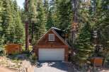 Nestled in a serene forest setting, this charming cabin offers a perfect blend of rustic charm and modern convenience.