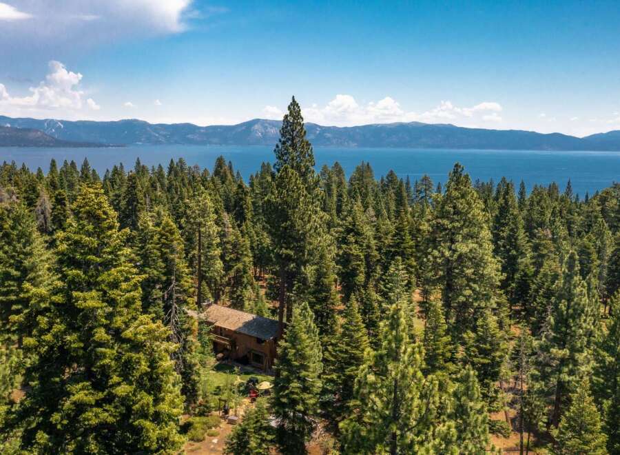 Nestled amidst a lush forest, this stunning property offers unparalleled privacy and tranquility.