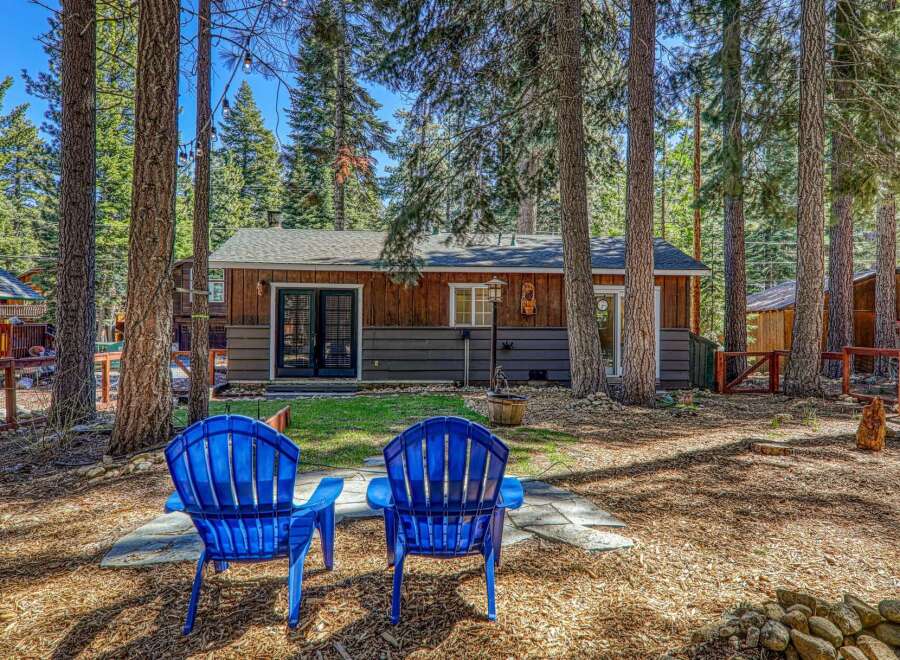 Escape to your dream cabin nestled in a serene wooded setting.