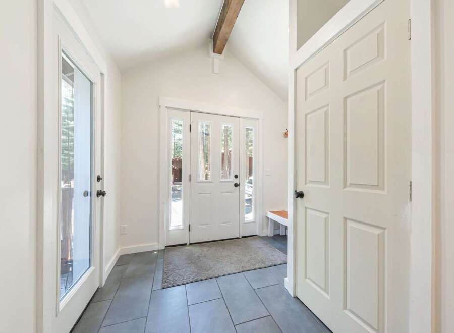 Step into this inviting entryway, featuring a bright and airy design.