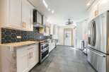 Step into this stunning kitchen, boasting modern design and high-end finishes.