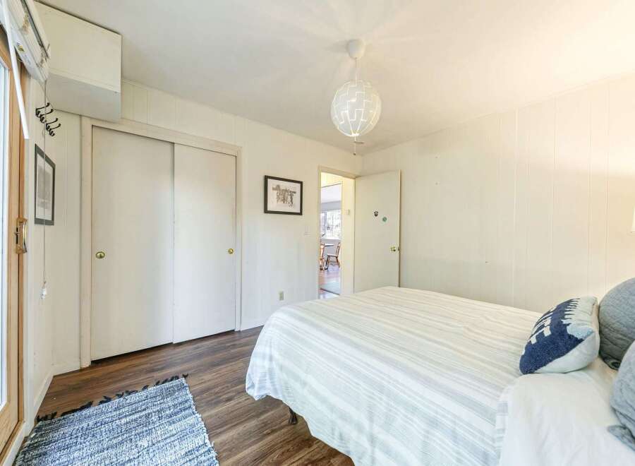 Discover the charm of this inviting bedroom, perfect for relaxation.