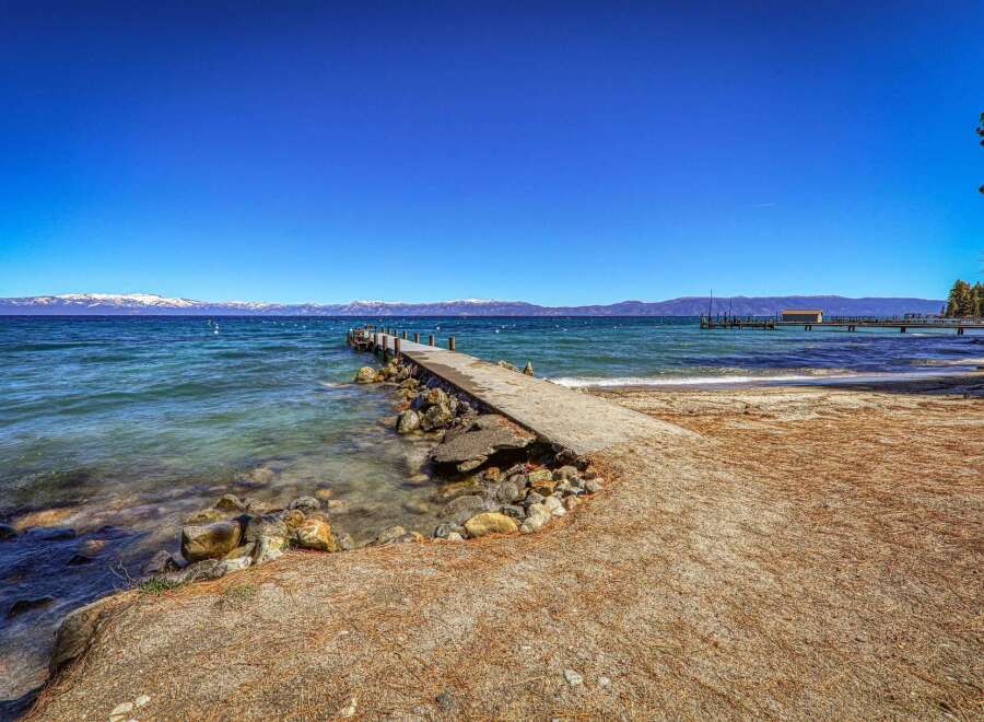 Discover the tranquility of lakeside living with this stunning property.
