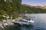 Experience luxury lakeside living with this stunning property featuring a private dock and boat lift, perfect for water enthusiasts.