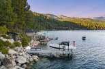 Experience luxury lakeside living with this stunning property featuring a private dock and boat lift, perfect for water enthusiasts.