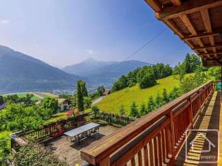 Experience breathtaking mountain views from this stunning property.