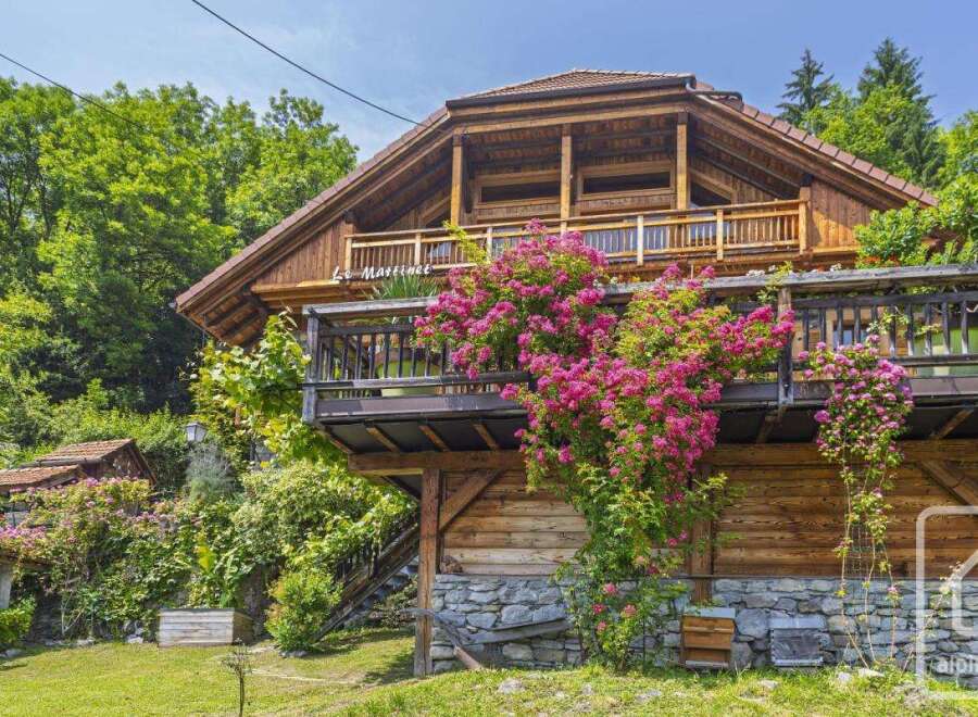 Nestled in a serene natural setting, this charming wooden chalet offers a perfect blend of rustic charm and modern comfort.