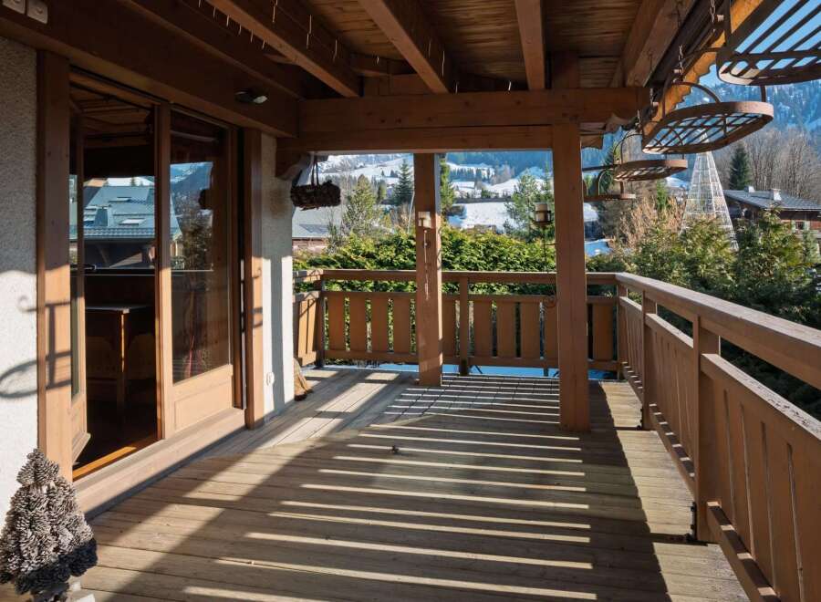 Enjoy breathtaking mountain views from this charming balcony.