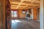 Step into a world of rustic charm with this stunning property, featuring a beautifully crafted wooden ceiling and warm wooden floors.